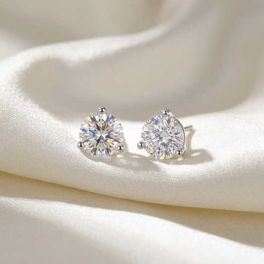 Three claw round diamond stud earrings - angled view