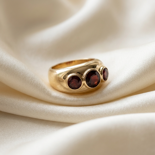 Garnet trilogy gold dome dress ring - side view