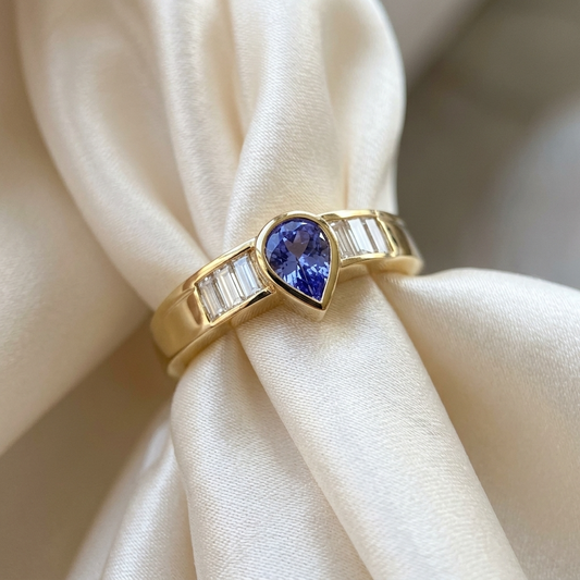 Pear shape Ceylon sapphire and baguette diamond ring - side view