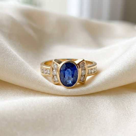 Oval Ceylon sapphire and diamond dress ring in yellow gold - side view