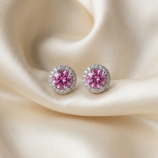 Pink tourmaline and diamond halo earrings - angled view
