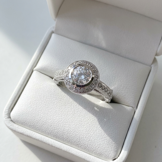Round brilliant diamond halo engagement ring in 18ct white gold — Diamond Imports Australia. © Diamond Imports 2026