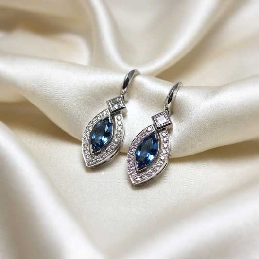 Marquise cut aquamarine and diamond halo drop earrings - side view