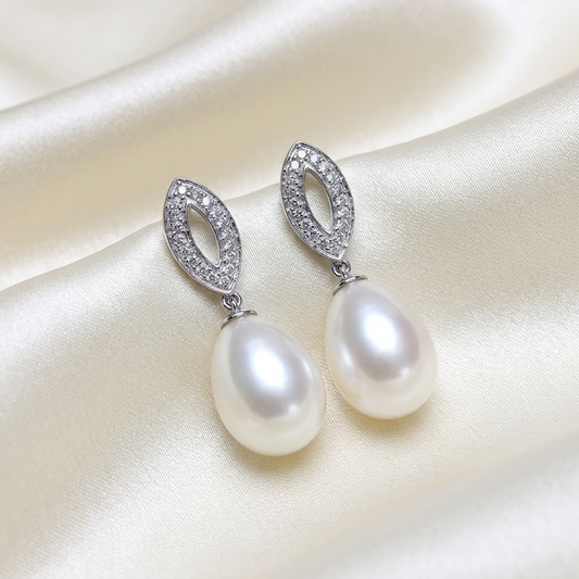 Freshwater pearl and diamond drop earrings - angled view