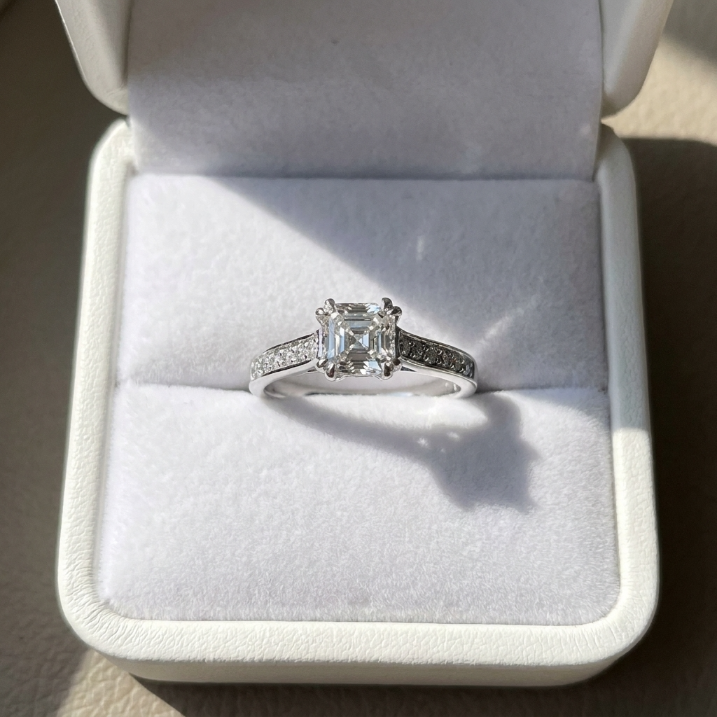 Asscher cut diamond ring with side stones - detail view