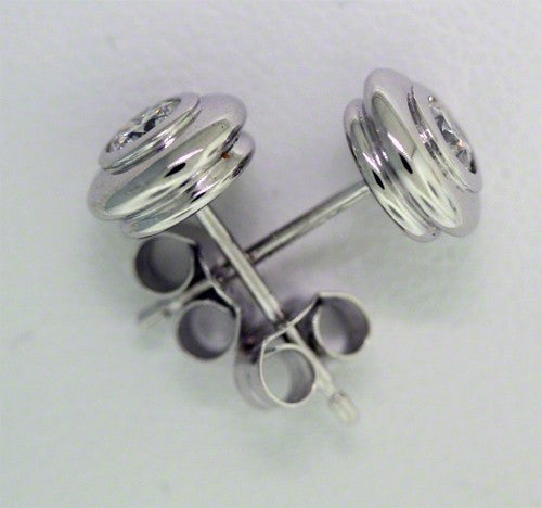 Bezel set round diamond stud earrings in 18ct white gold