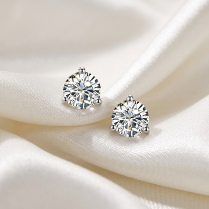 Three claw round diamond stud earrings in white gold