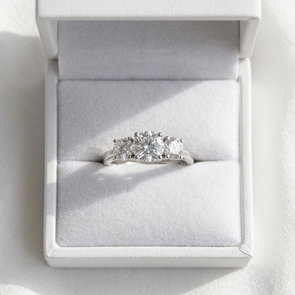 Anouk round brilliant diamond three stone engagement ring, side view