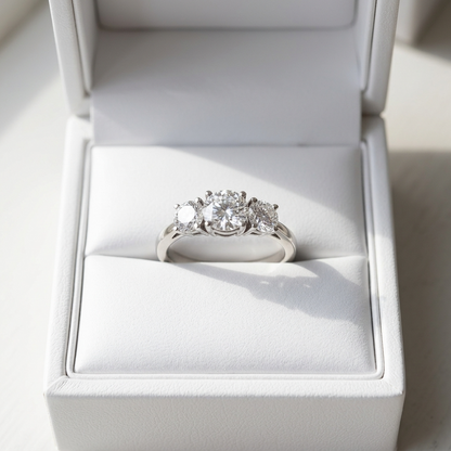 Anouk round brilliant diamond three stone engagement ring detail