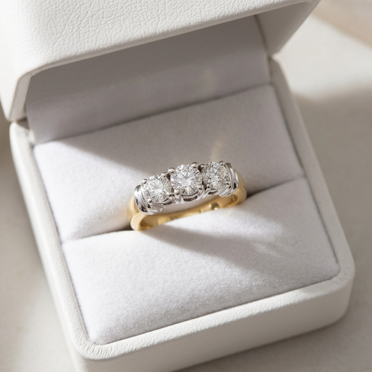 Sabine round brilliant diamond three stone engagement ring on white gold band