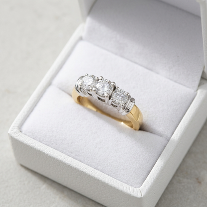 Sabine round brilliant diamond three stone engagement ring, front view