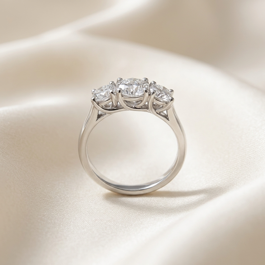 Eleanor round brilliant diamond three stone engagement ring in white gold