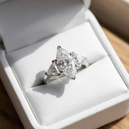 Margaux marquise cut diamond three stone engagement ring, side view