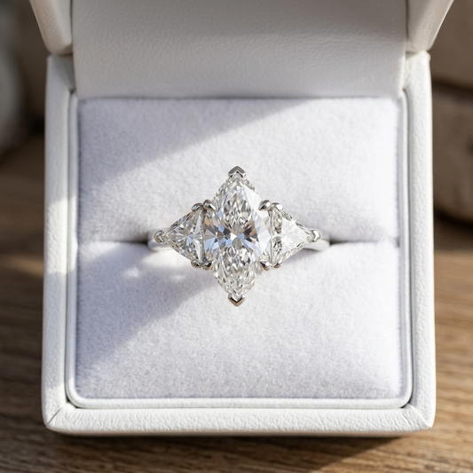 Margaux marquise cut diamond three stone engagement ring detail
