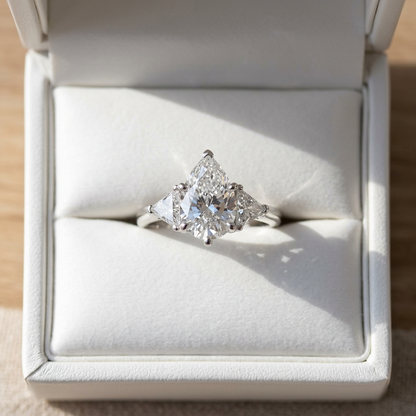 Genevieve pear shaped diamond three stone engagement ring, alternate view