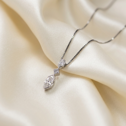 Three stone marquise diamond pendant - angled view