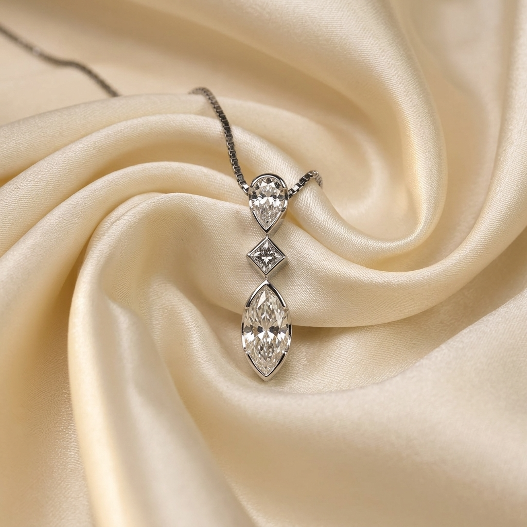 Three stone marquise diamond pendant - detail view