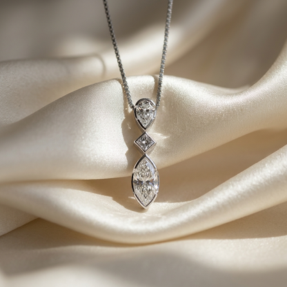Three stone marquise diamond pendant - close up