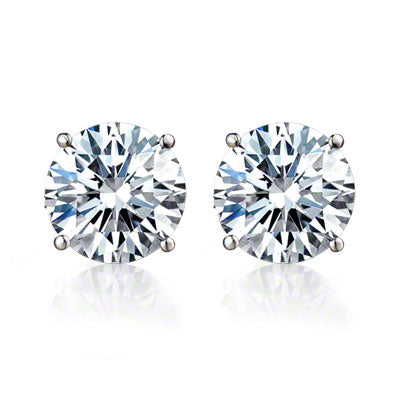 Round brilliant cut diamond stud earrings in 18ct white gold four-claw setting
