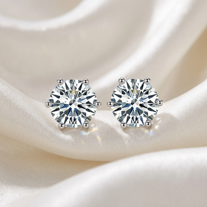 Six claw round diamond stud earrings in white gold
