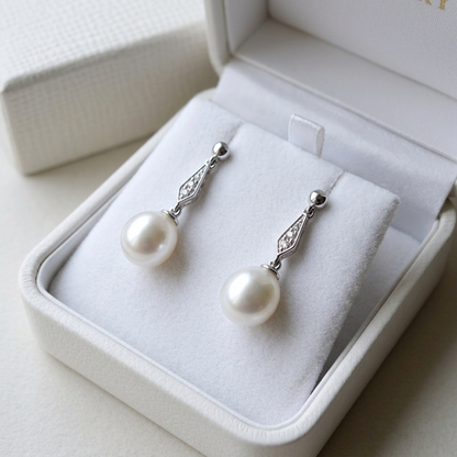 Antique style pearl and diamond drop earrings - detail view