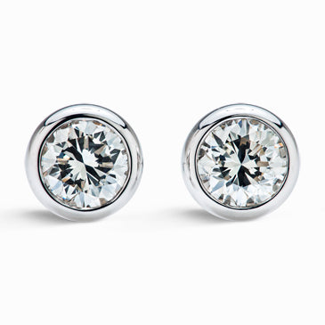 Bezel set round diamond stud earrings in 18ct white gold