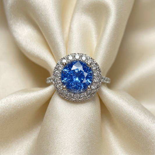 Ceylon blue sapphire and diamond halo engagement ring in white gold — handcrafted in Sydney