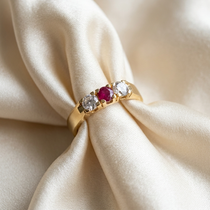 Antique style ruby and diamond three stone ring - angled view