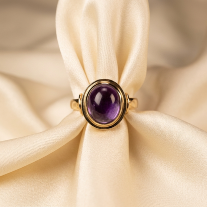 Amethyst cabochon gold dress ring - angled view