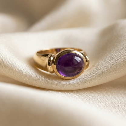 Oval cabochon amethyst gold dress ring - side view