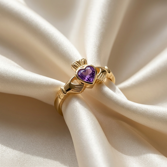 Amethyst Claddagh dress ring in yellow gold