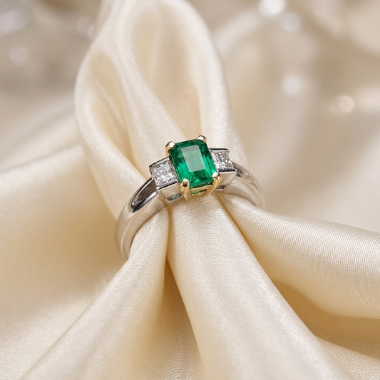 African emerald and baguette cut diamond ring in 18ct white and yellow gold