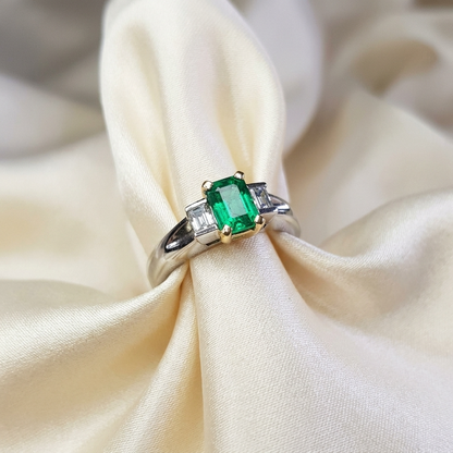 African emerald and baguette cut diamond ring - angled view