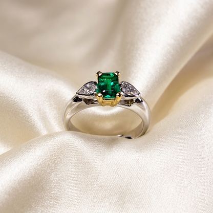 African emerald and pear shape diamond ring in 18ct white and yellow gold