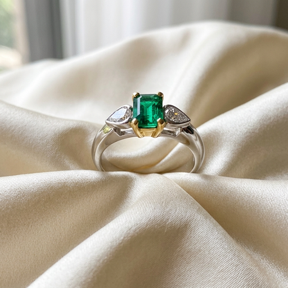 African emerald and pear shape diamond ring - detail view