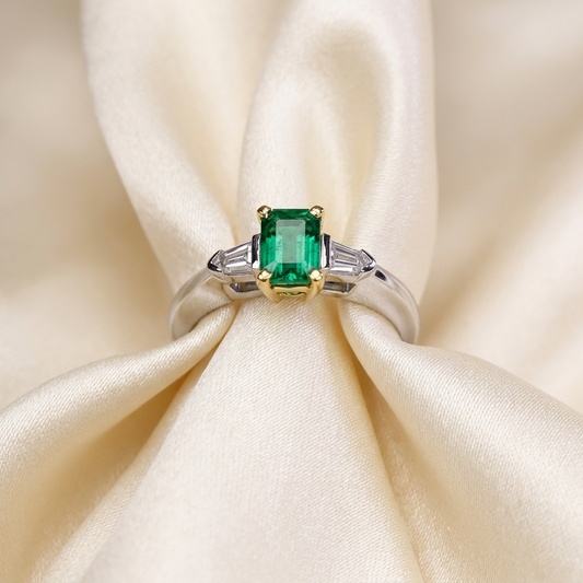 African emerald and bullet cut diamond ring in 18ct white and yellow gold