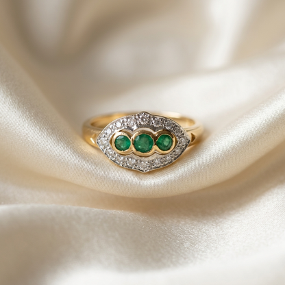 Antique style emerald and diamond dress ring in 9ct yellow and white gold