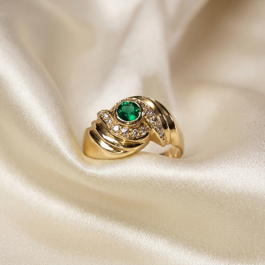 Round emerald and pave diamond ring in 9ct yellow gold