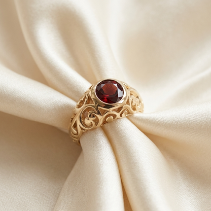 Garnet gold dress ring - angled view