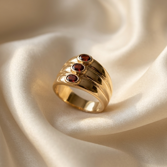 Garnet trilogy gold dome dress ring - side view