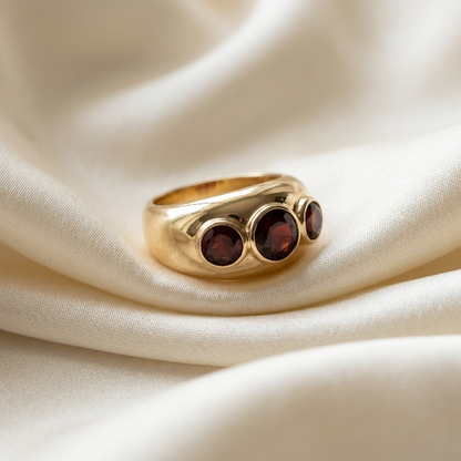 Garnet trilogy gold dome dress ring - side view