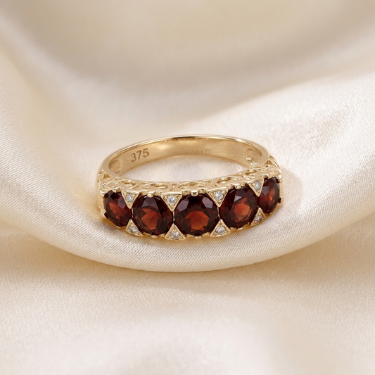 Antique style garnet and diamond gold ring