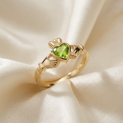 Peridot Claddagh dress ring - angled view
