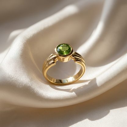 Round peridot gold dress ring - side view