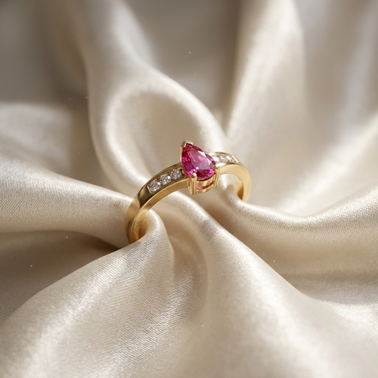 Pear shape ruby and diamond chevron ring - side view