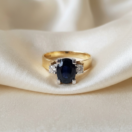 Oval Australian blue sapphire and diamond ring in 18ct yellow and white gold