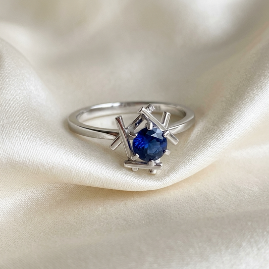 Round Australian blue sapphire ring in 18ct white gold