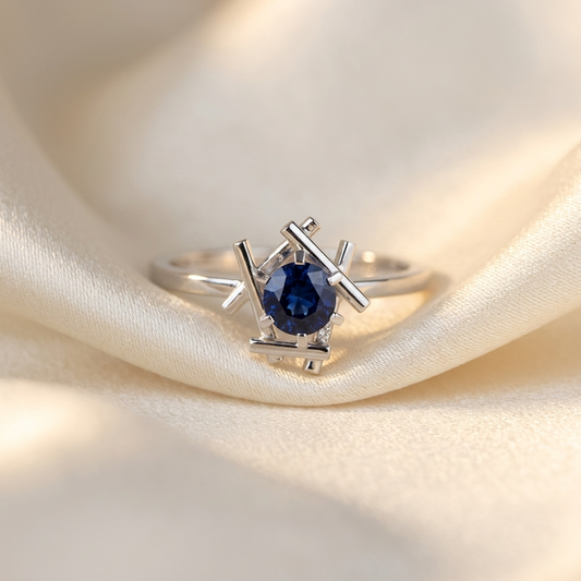 Round Australian blue sapphire ring in 18ct white gold - side view