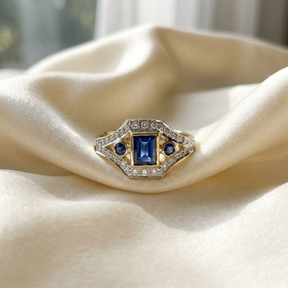 Emerald cut Ceylon sapphire and diamond antique style ring - side view
