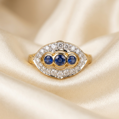 Antique style Ceylon sapphire and diamond ring in 9ct yellow and white gold